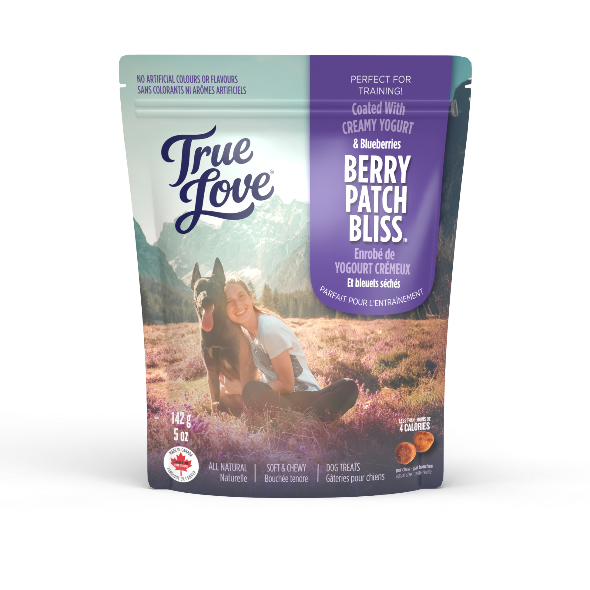 Bag of True Love dog treats with a girl and her dog on the front. Berry Patch Bliss - coated with creamy yogurt and blueberries.
