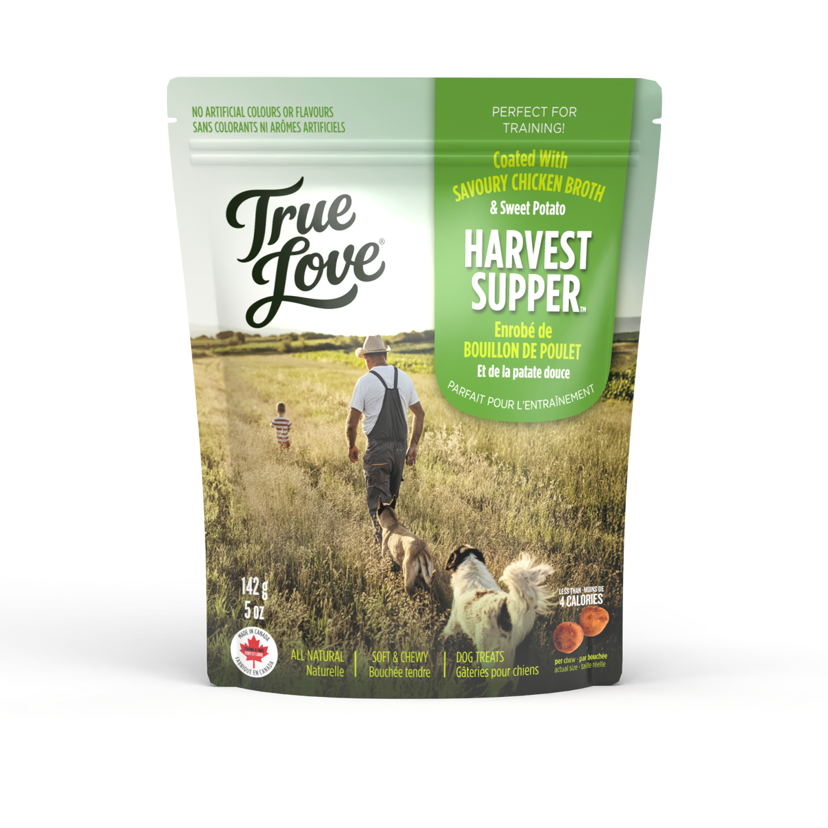 Bag of True Love dog treats with a prairie setting and two dogs on the front. Harvest Supper flavour - savoury chicken broth and sweet potato.