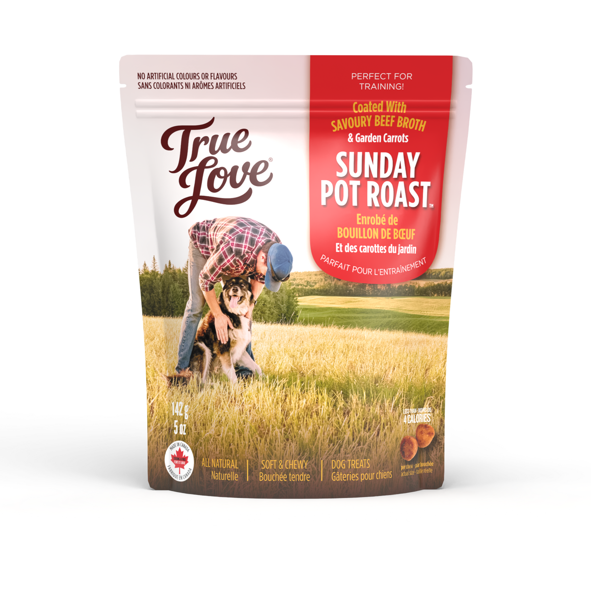 Bag of True Love dog treats with a scenic background. Harvest Supper flavour - savoury beef broth and garden carrots.